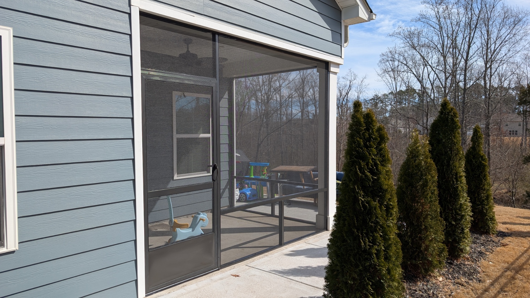 Screened Porch: Screened patio with heavy-duty door