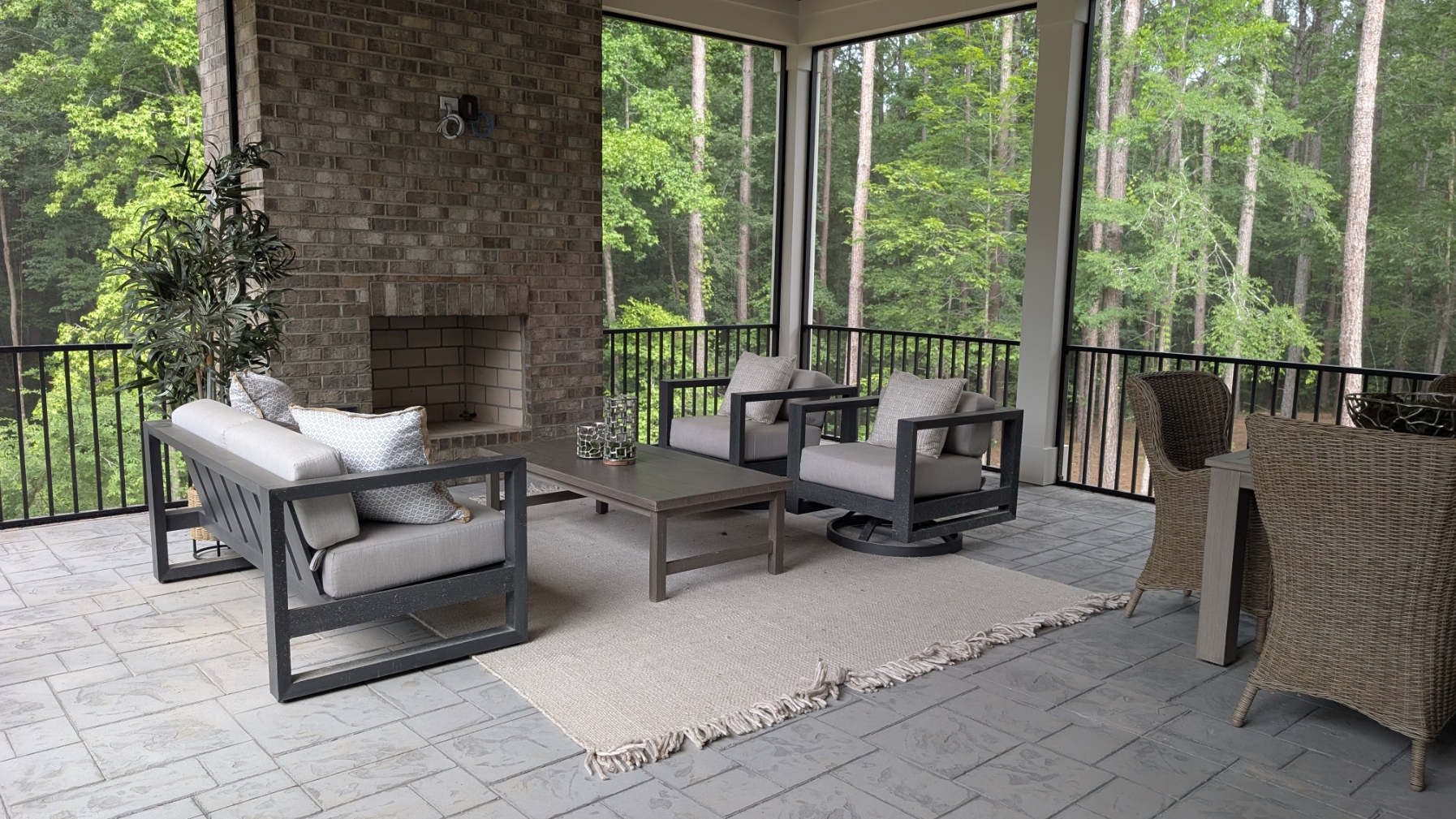 Screened Porch: Fireplace lounge with forest views
