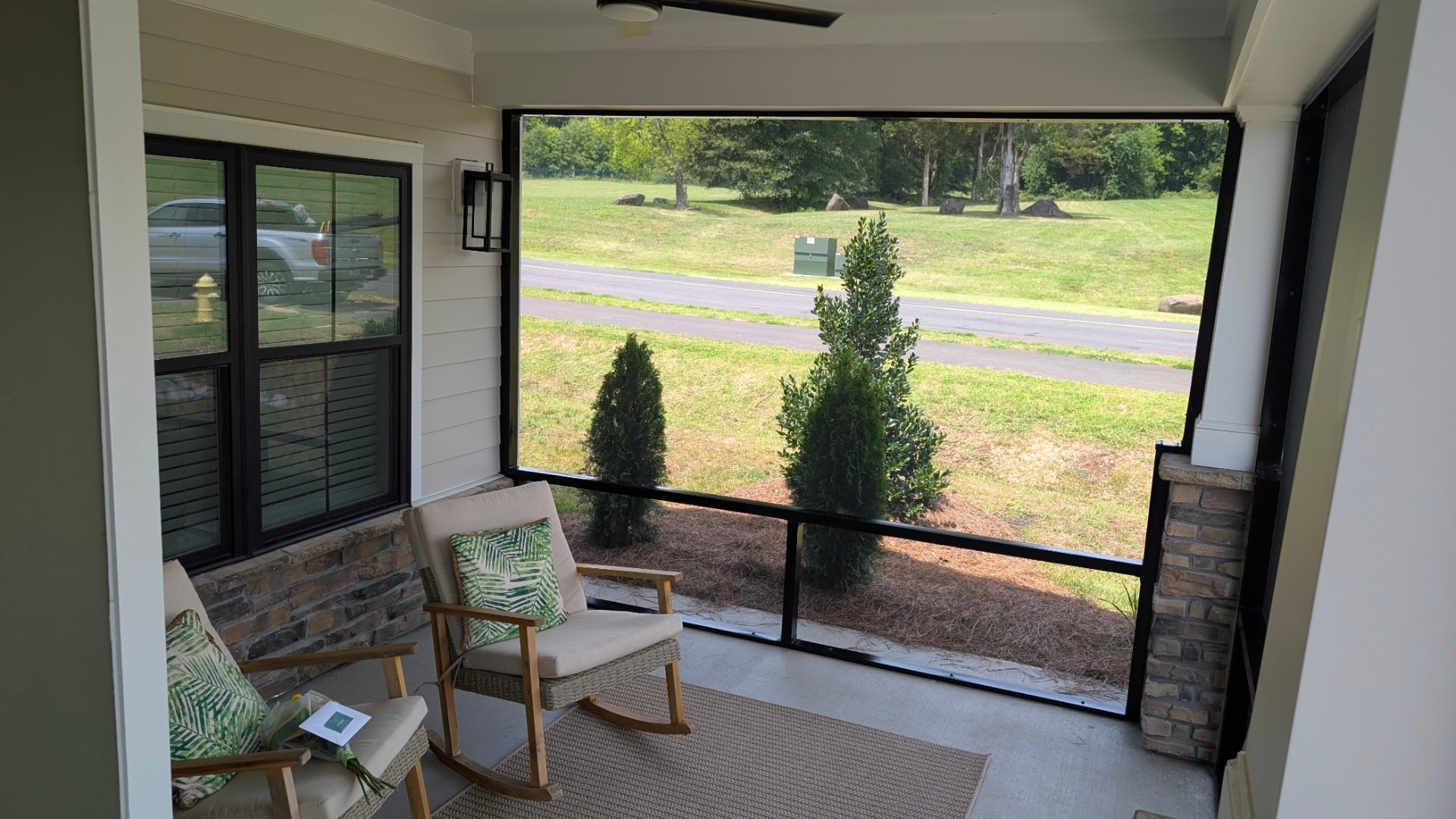 Screened Porch: Rocking-chair porch interior