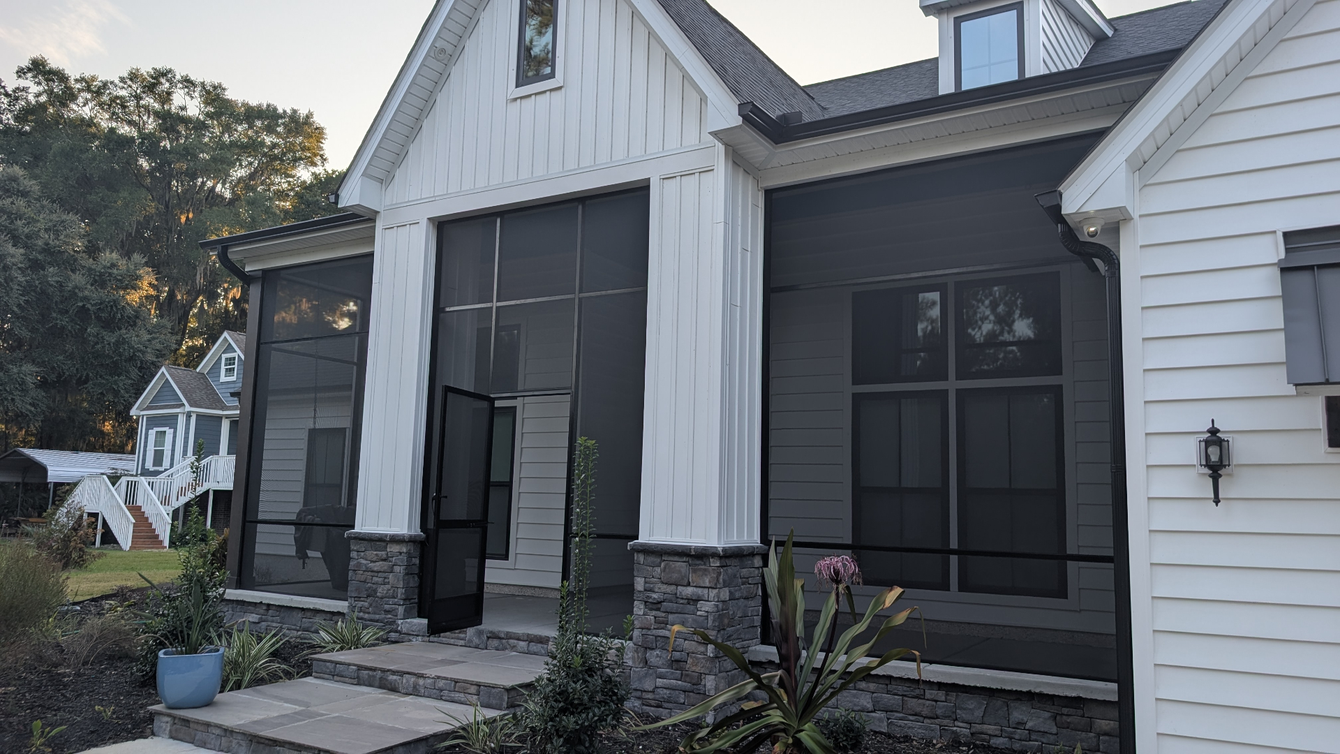 Screened porch interior with premium materials